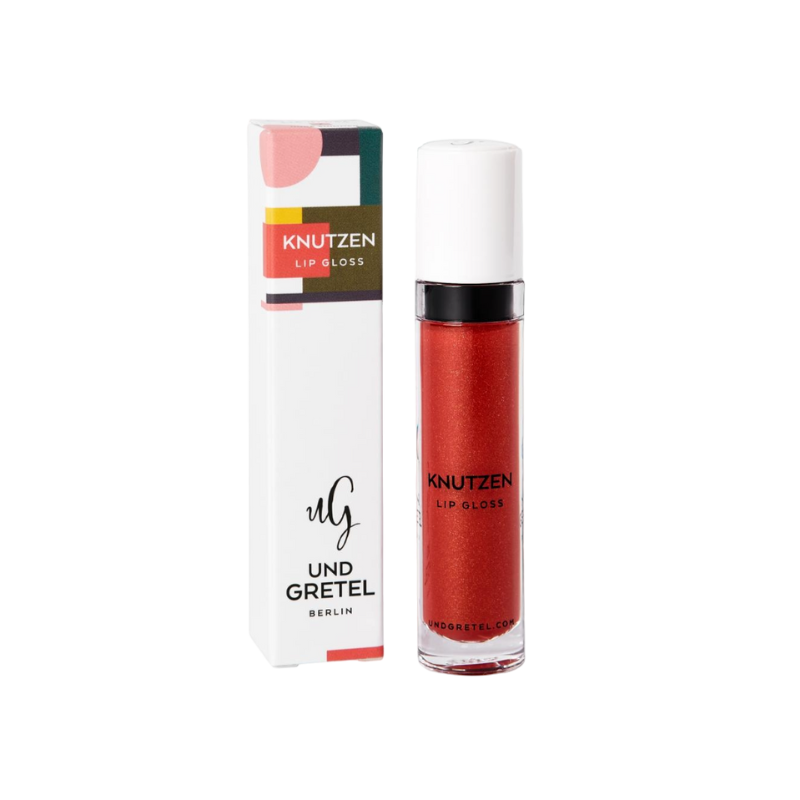 UND-GRETEL-KNUTZEN-LIP-GLOSS-08-SUNRISE-RED-SHIMMER UND GRETEL KNUTZEN Lip Gloss 08 Sunrise Red Shimmer, Verpackung und Flasche, auf weißem Hintergrund.