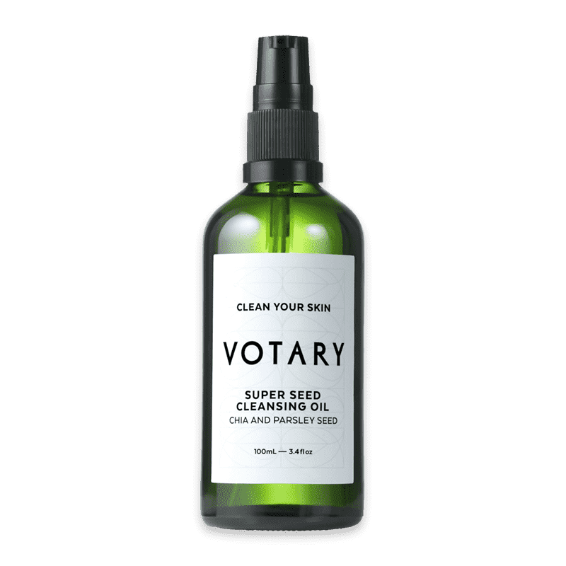VOTARY Super Seed Cleansing Oil, 100ml Flasche, Chia- und Petersiliensamen, auf weißem Hintergrund.