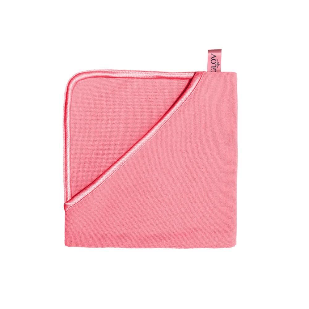 image_111573_2 Rosa Mikrofaser-Handtuch mit umgeschlagener Ecke und Etikett.