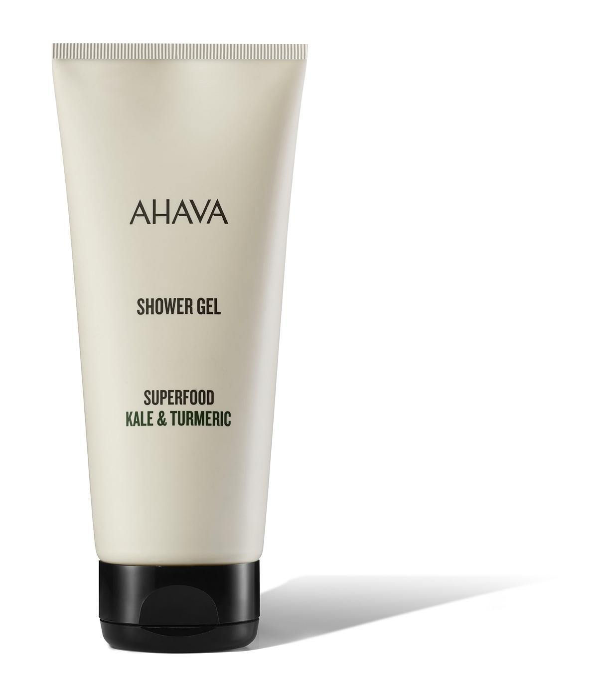 AHAVA Duschgel Superfood Kale & Turmeric in einer weißen Tube mit schwarzem Deckel.