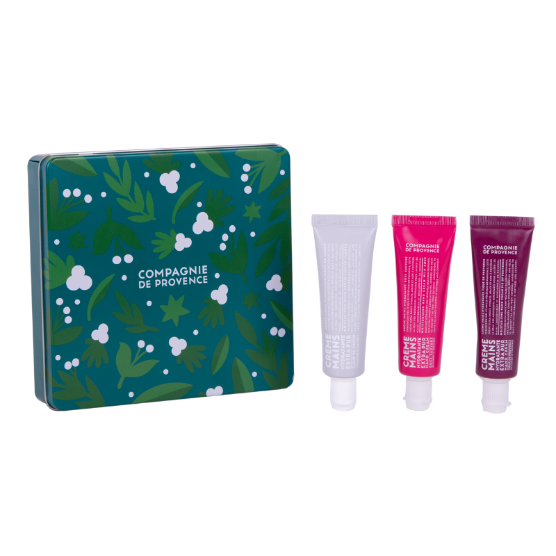Drei Handcremes in Tuben und eine grüne Metalldose mit Pflanzenmuster von Compagnie de Provence.