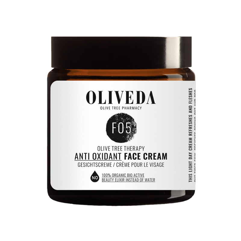 OLIVEDA-F05-ANTI-OXIDANT-FACE-CREAM OLIVEDA F05 Anti-Oxidant Gesichtscreme in braunem Glasbehälter mit weißem Etikett und schwarzem Deckel.