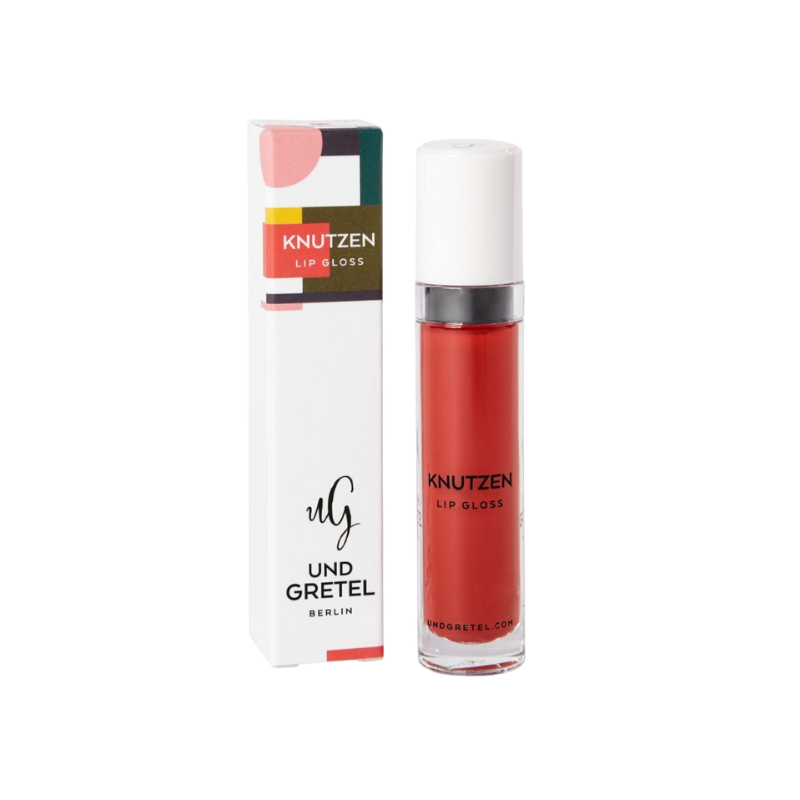 UND-GRETEL-KNUTZEN-LIP-GLOSS-04-MATTE-SUNRISE-RED UND GRETEL KNUTZEN Lip Gloss 04 Matte Sunrise Red, Produktbild mit Verpackung und Lipgloss-Flasche.