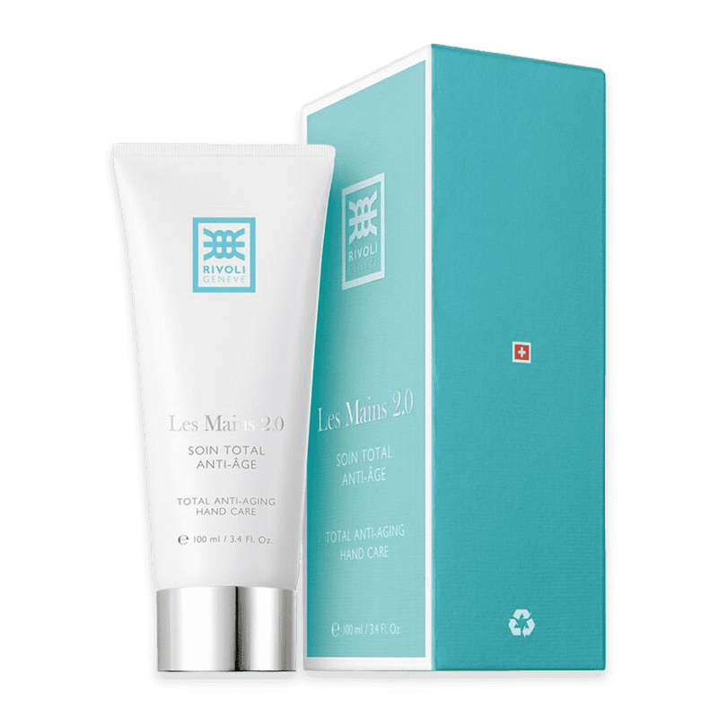 Rivoli Genève Les Mains 2.0 Soin Total Anti-Aging Handpflege neben Verpackung.