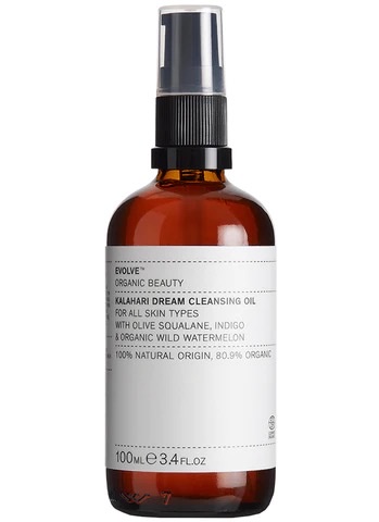 Braunes Glasfläschchen mit Sprühkopf, beschriftet mit 'Evolve Organic Beauty Kalahari Dream Cleansing Oil'.