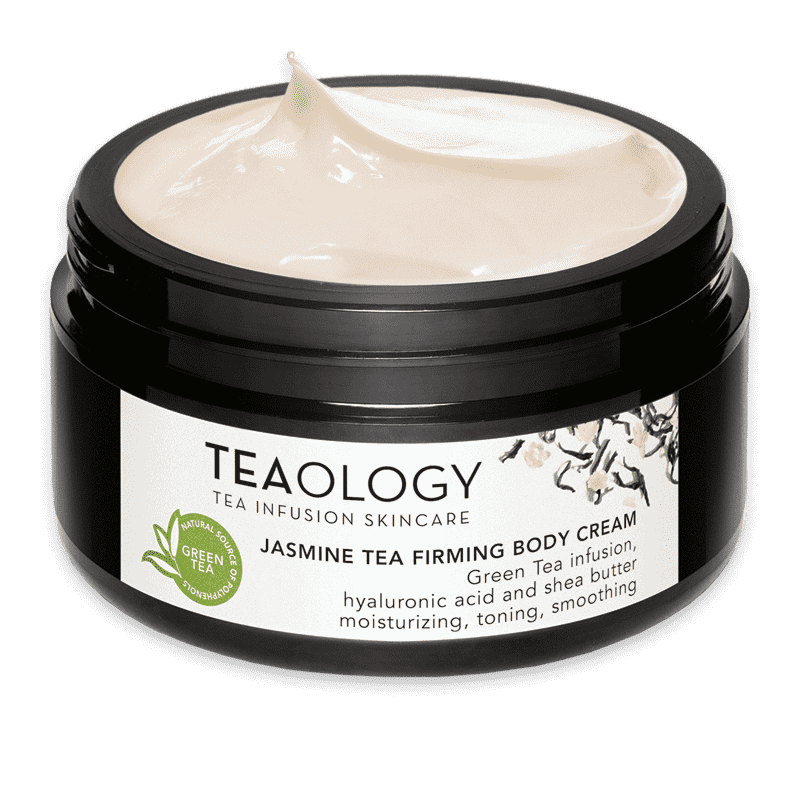 T50203-8050148502036-Jasmine-Tea-Firming-Body-cream-Alta_optimized Schwarze Dose mit Jasmine Tea Firming Body Cream von Teaology, geöffnet, weiße Creme sichtbar.